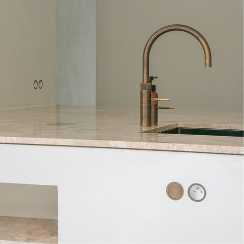 Ronde inbouw schakelaar en stopcontact wit brons modern minimalistisch